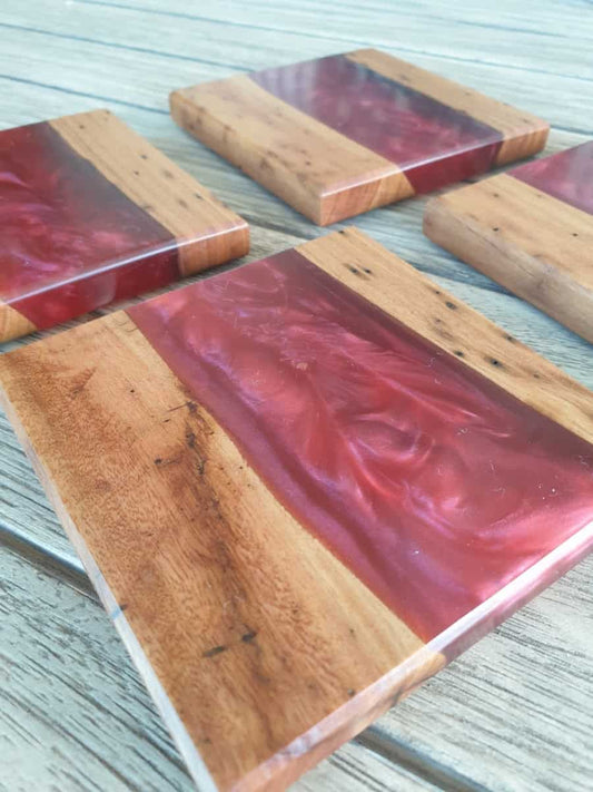 Red resin and timber coasters